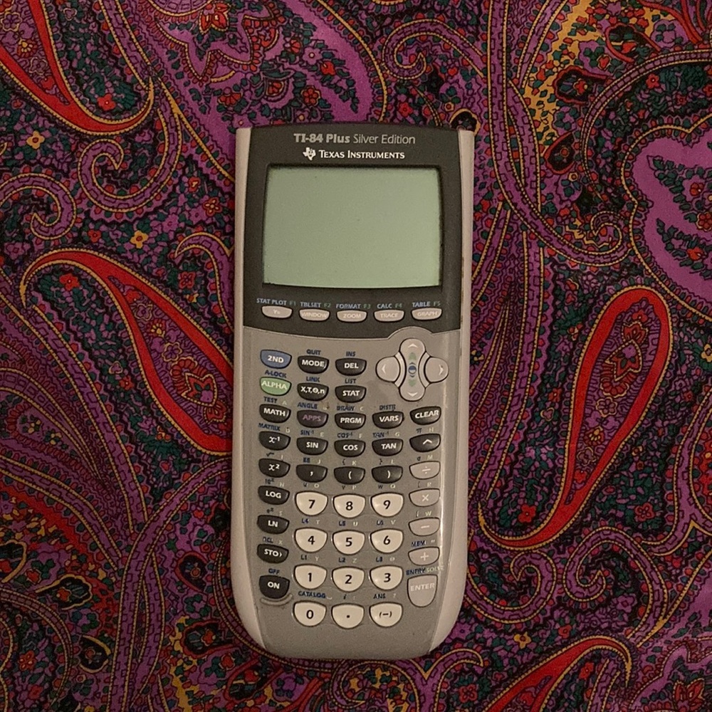 T1-84 Plus silver Texas instrument graphing calculator
